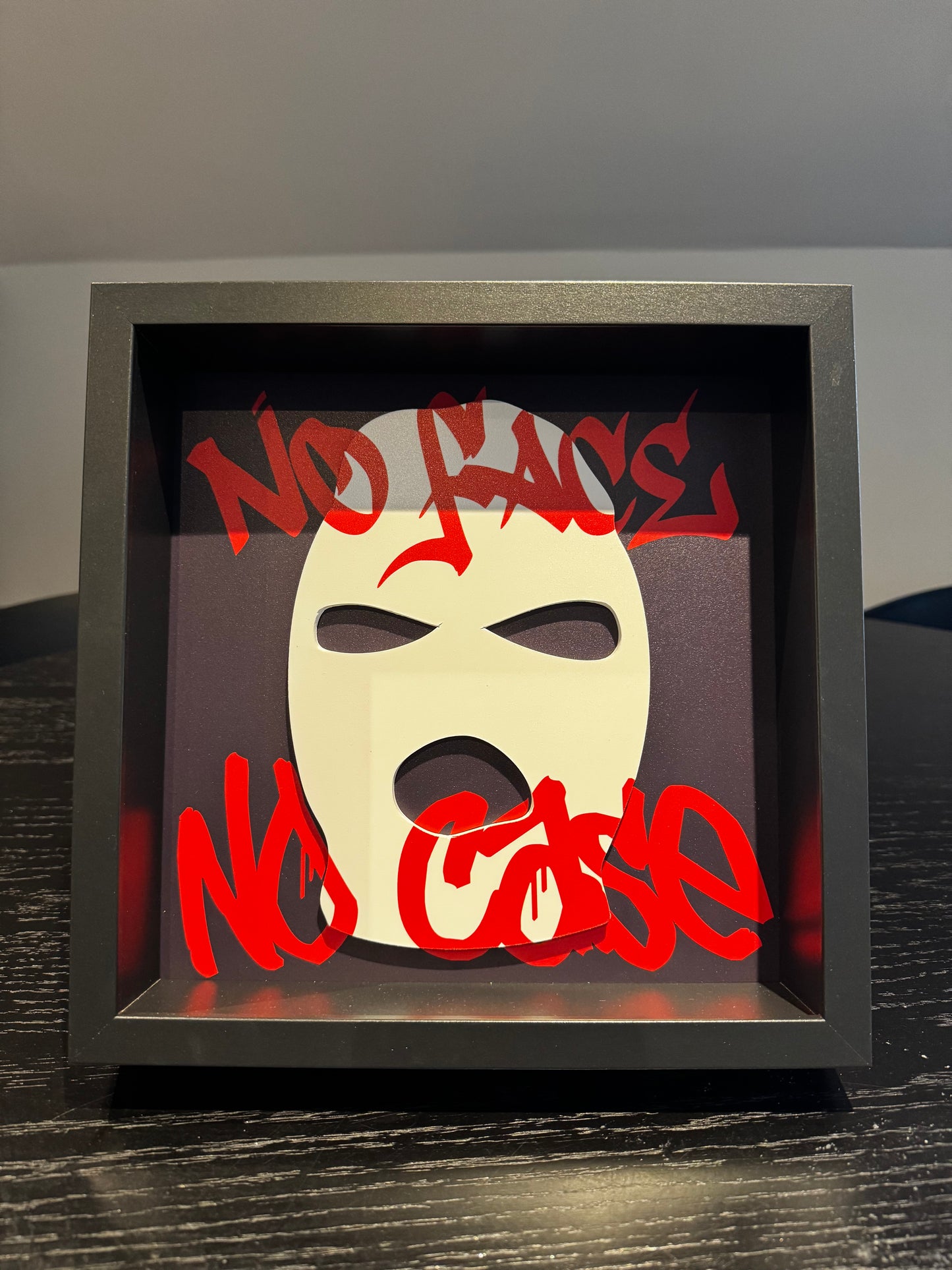 “No Face, No Case” - Box frame