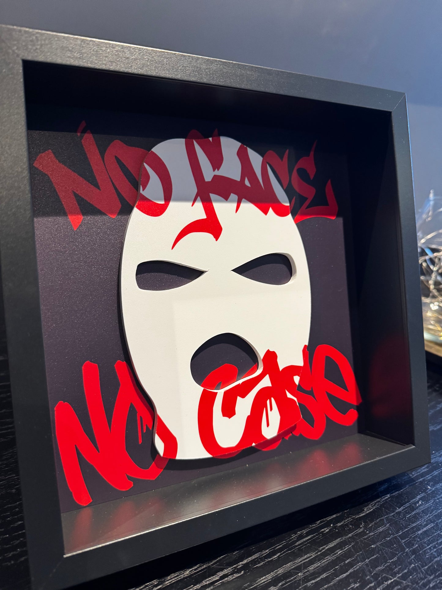 “No Face, No Case” - Box frame