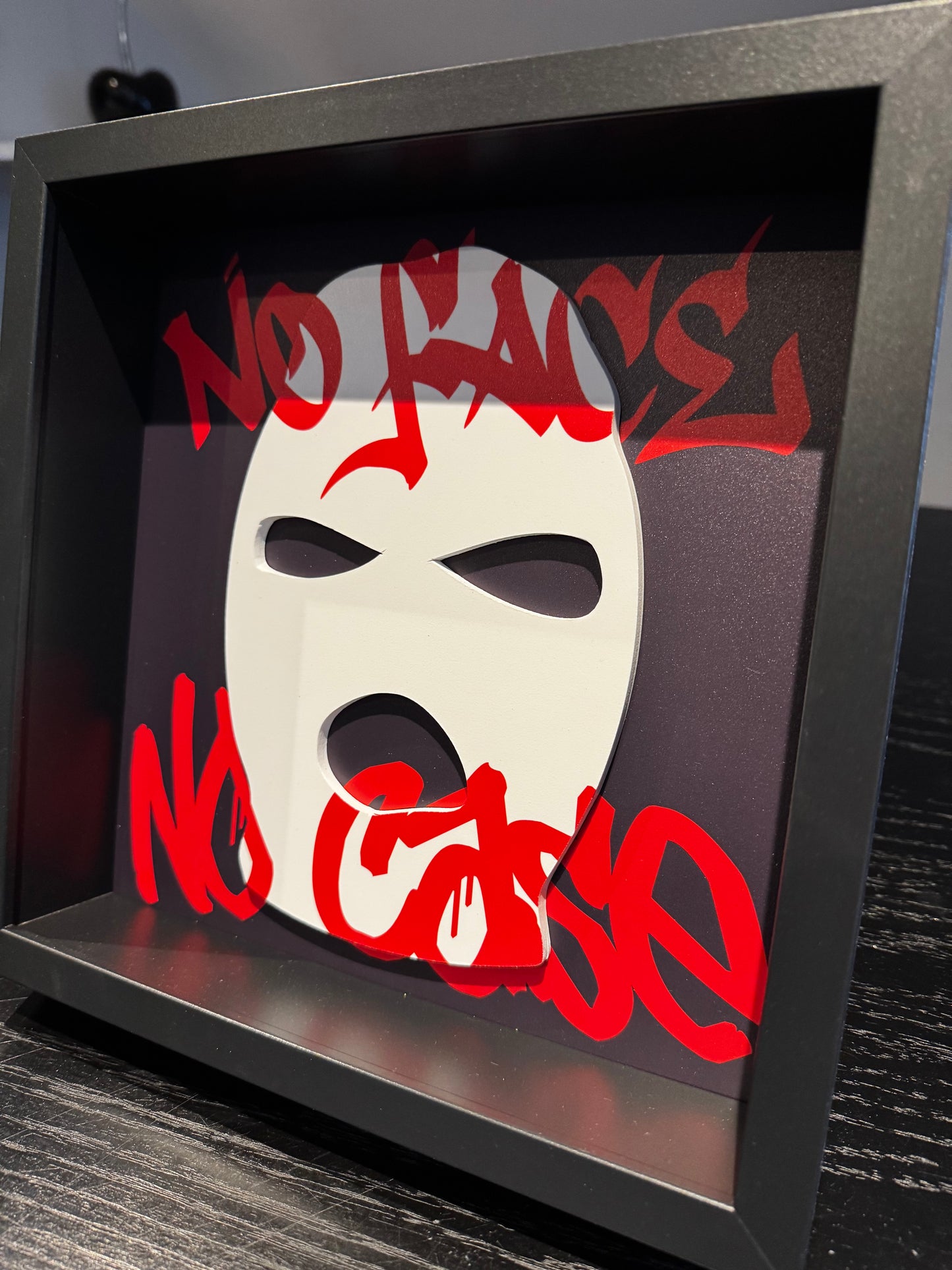 “No Face, No Case” - Box frame
